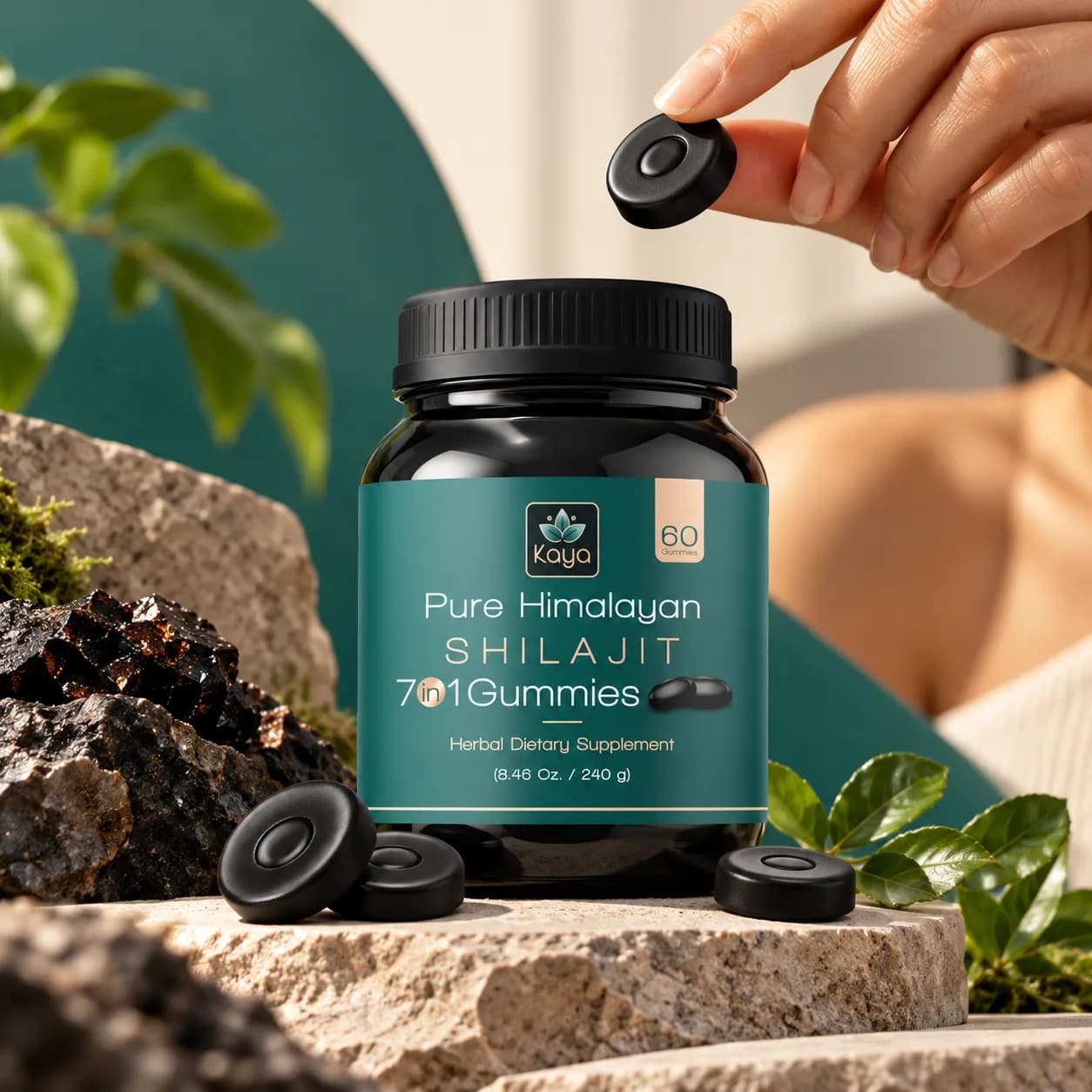 Kaya Pure Shilajit 7 in 1 gummies outdoors with a hand holding a gummy