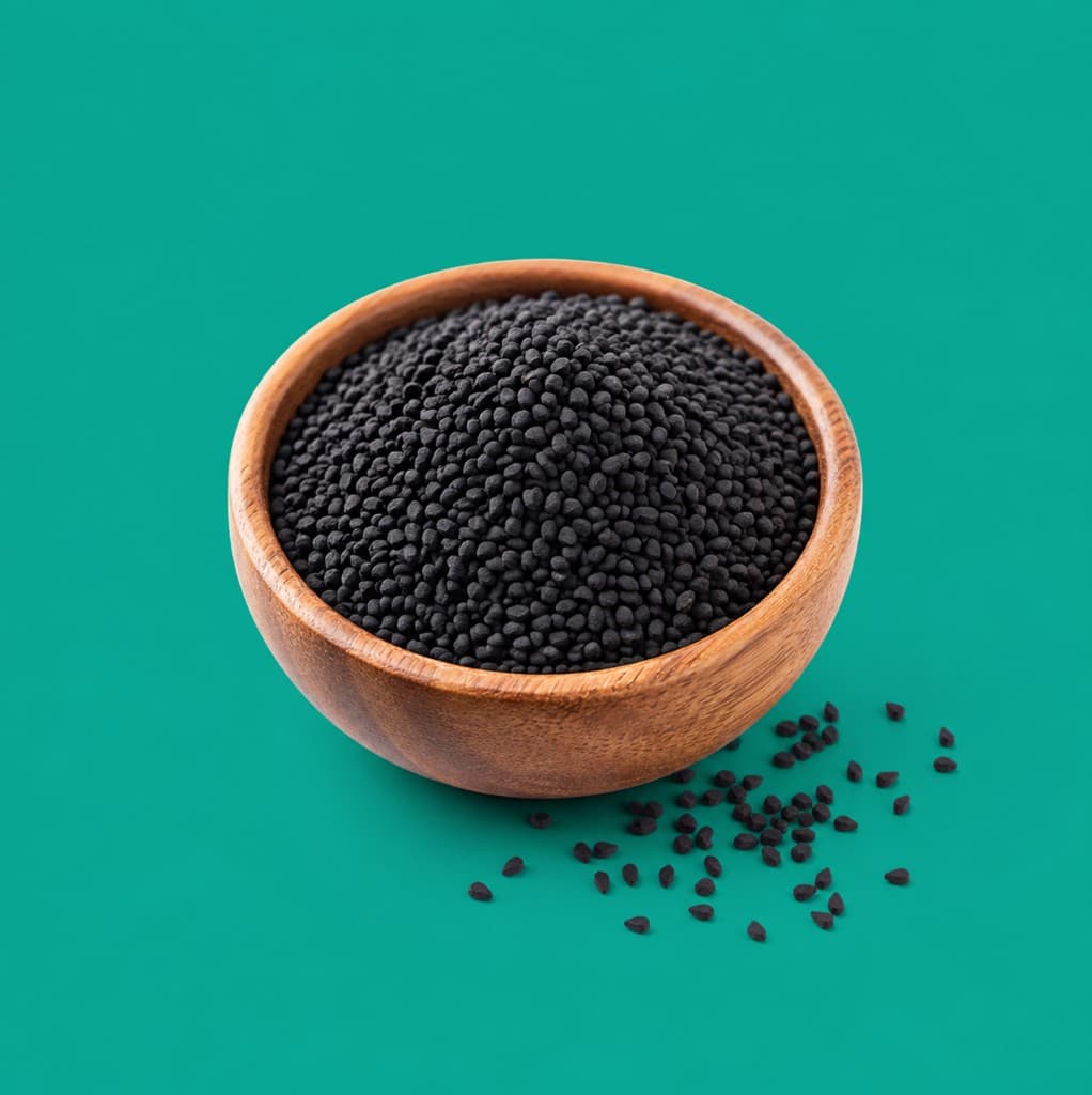 Black seed in a wooden bowl